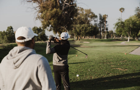 golfer swinging forgiving iron