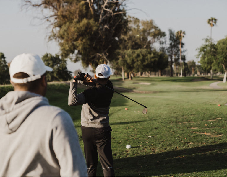 golfer swinging forgiving iron