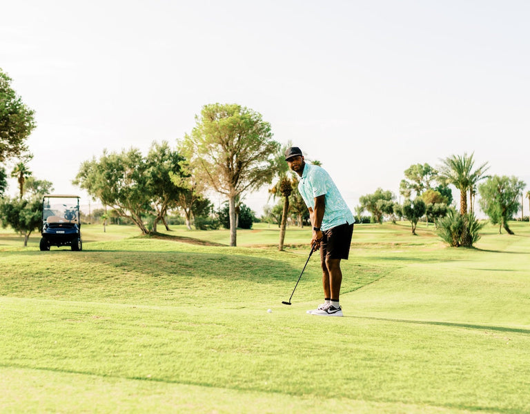 golfer getting ready to putt