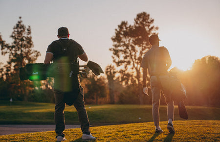 golfers enjoying new gear on the course