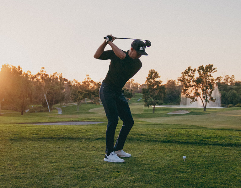 golfer hitting a fade