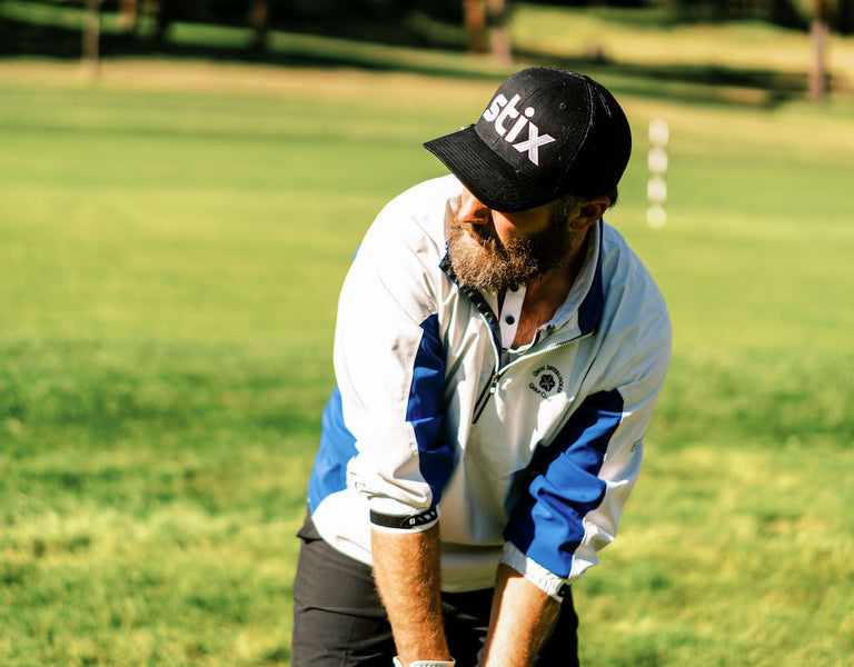 golfer lining up a high shot
