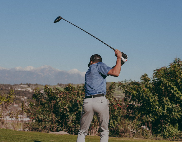 golfer about to crush a drive