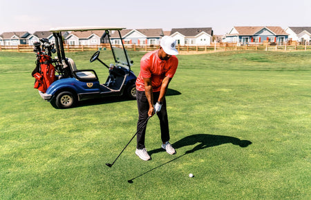 golfer using Stix hybrid club on fairway