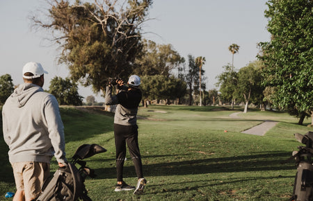 golfers on a par 3 course