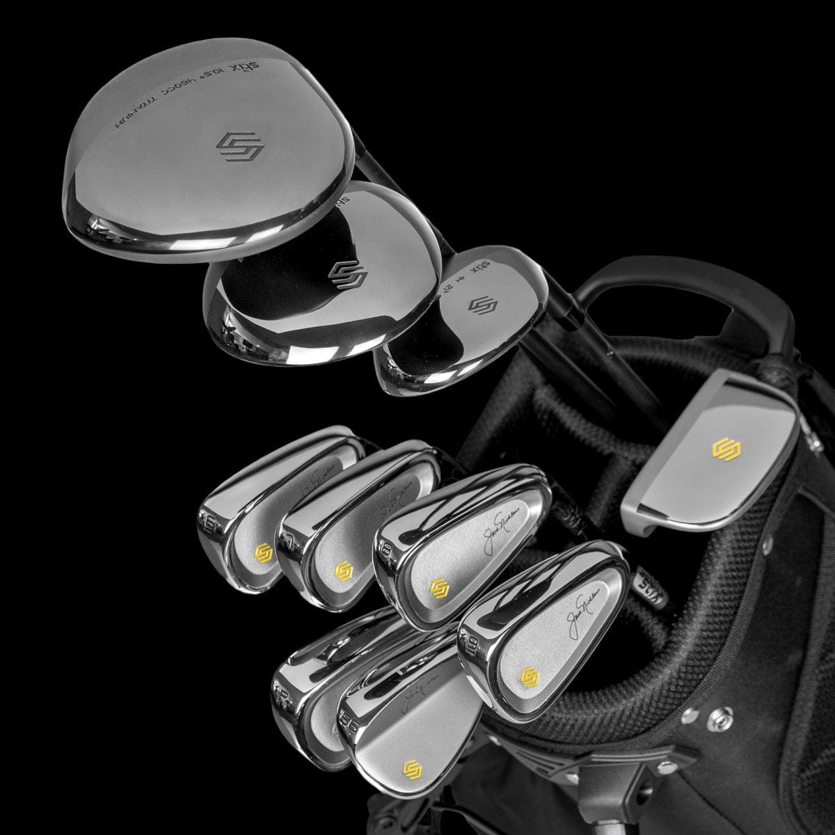 Nicklaus Essentials 10 — matte black bag with Nicklaus signature, clubs angled