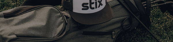 Stix golf clubs and a hat