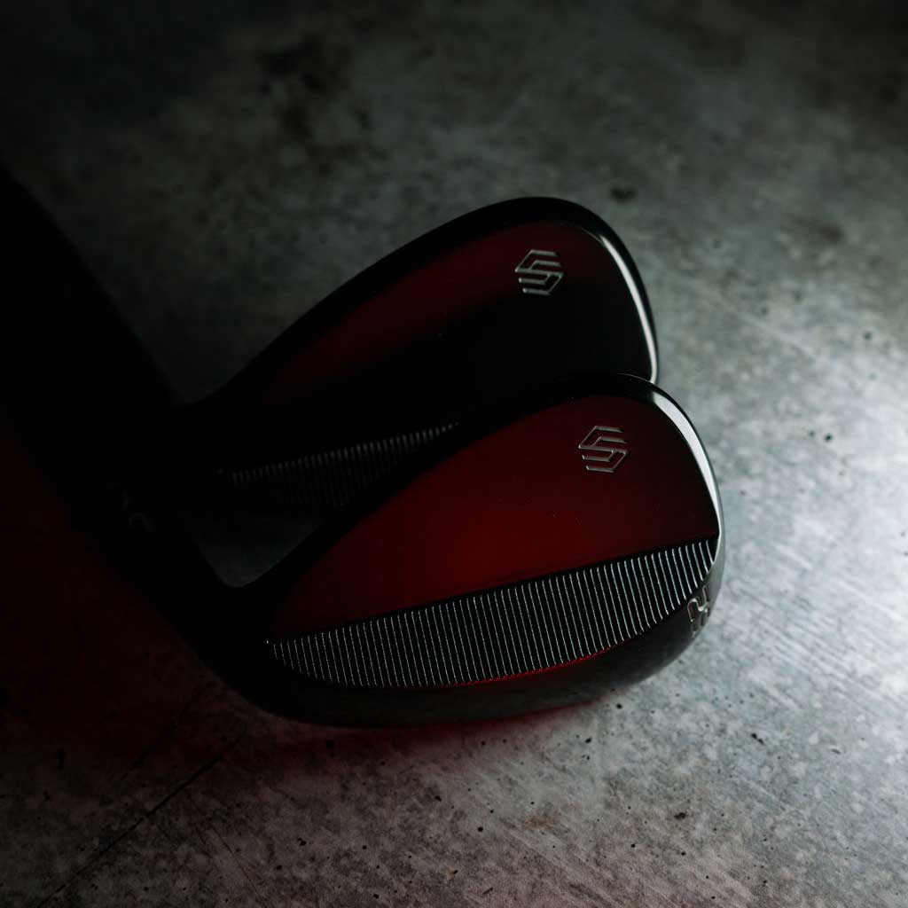 The Compete 14 Club Set: matte black driver, irons, and wedges loaded into a black Stix stand bag.