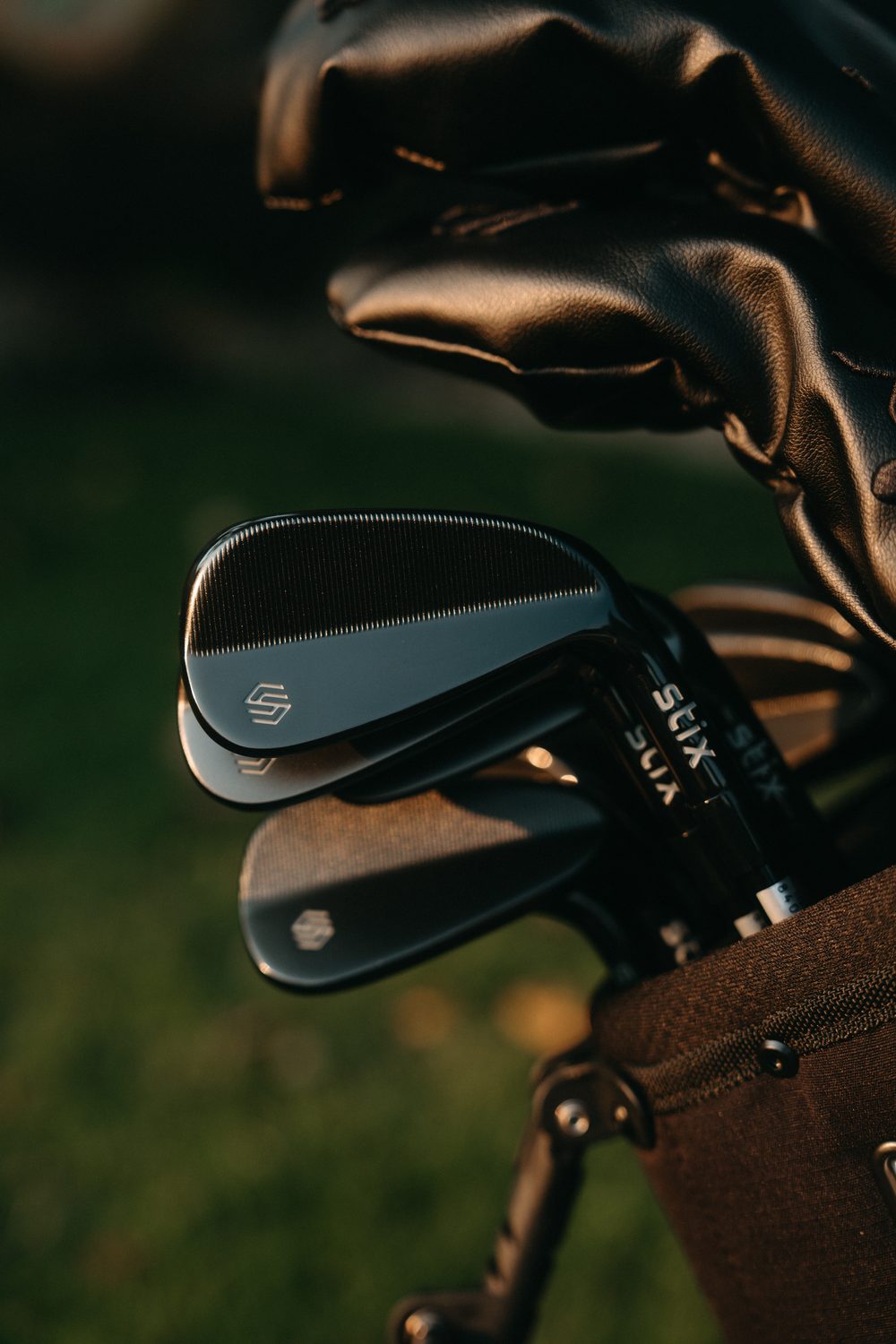 Black Stix wedges in a bag at golden hour